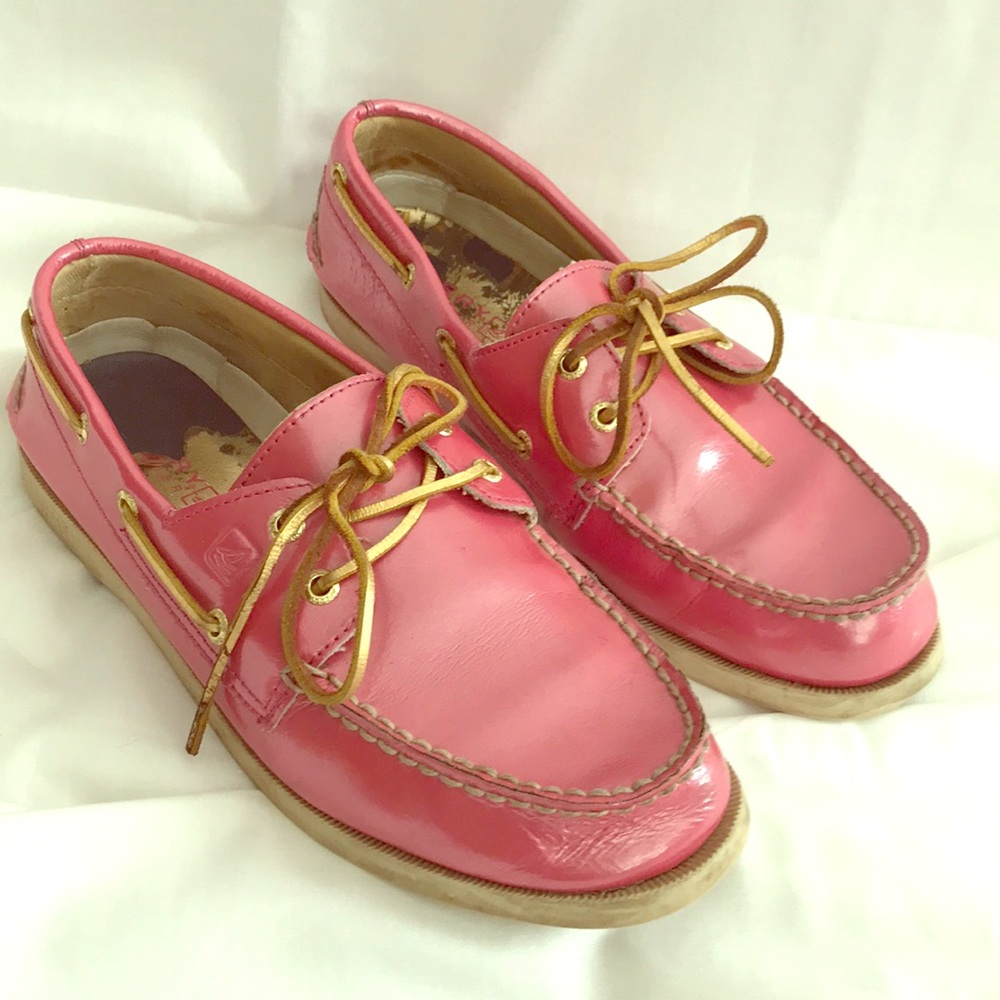 Pink leather Sperry boat shoe.